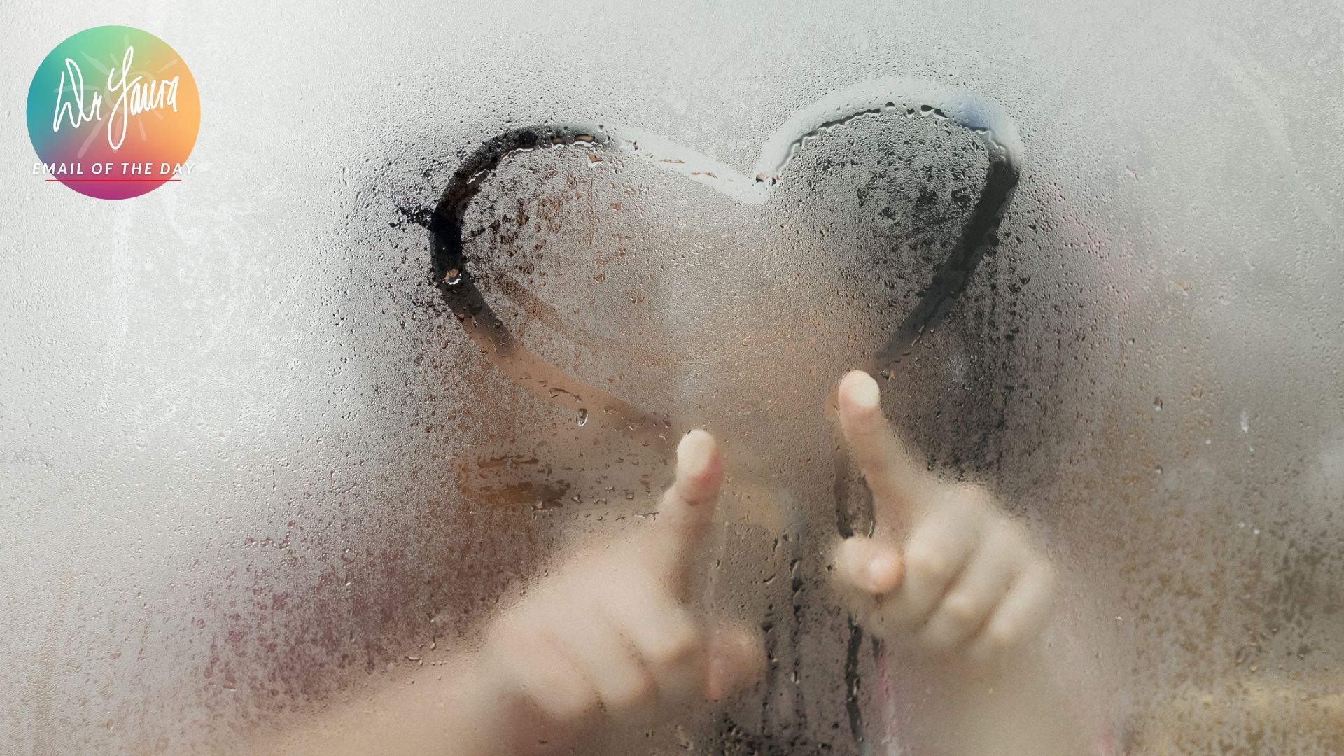 Two people draw a heart on the shower door
