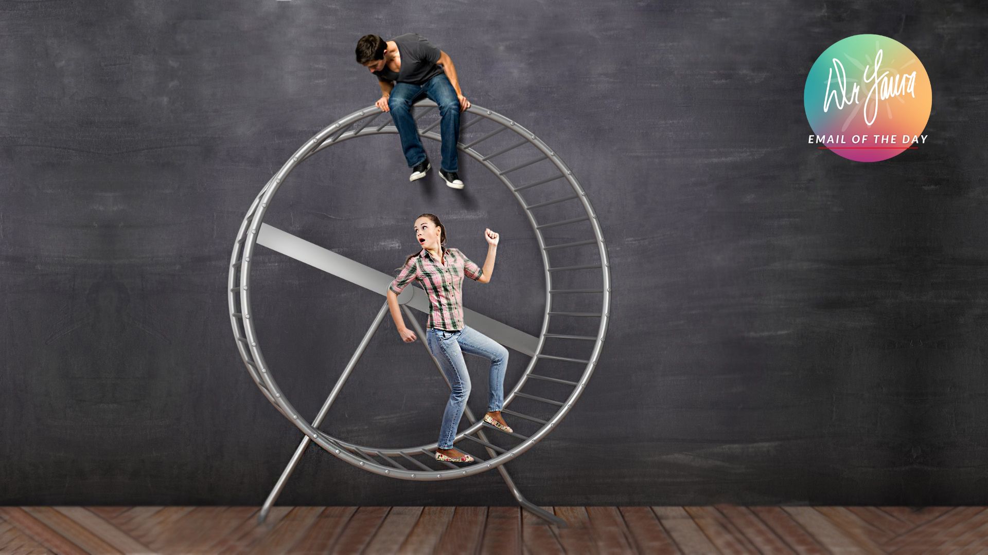 Woman runs in a human-sized hamster wheel while man sits on top of it