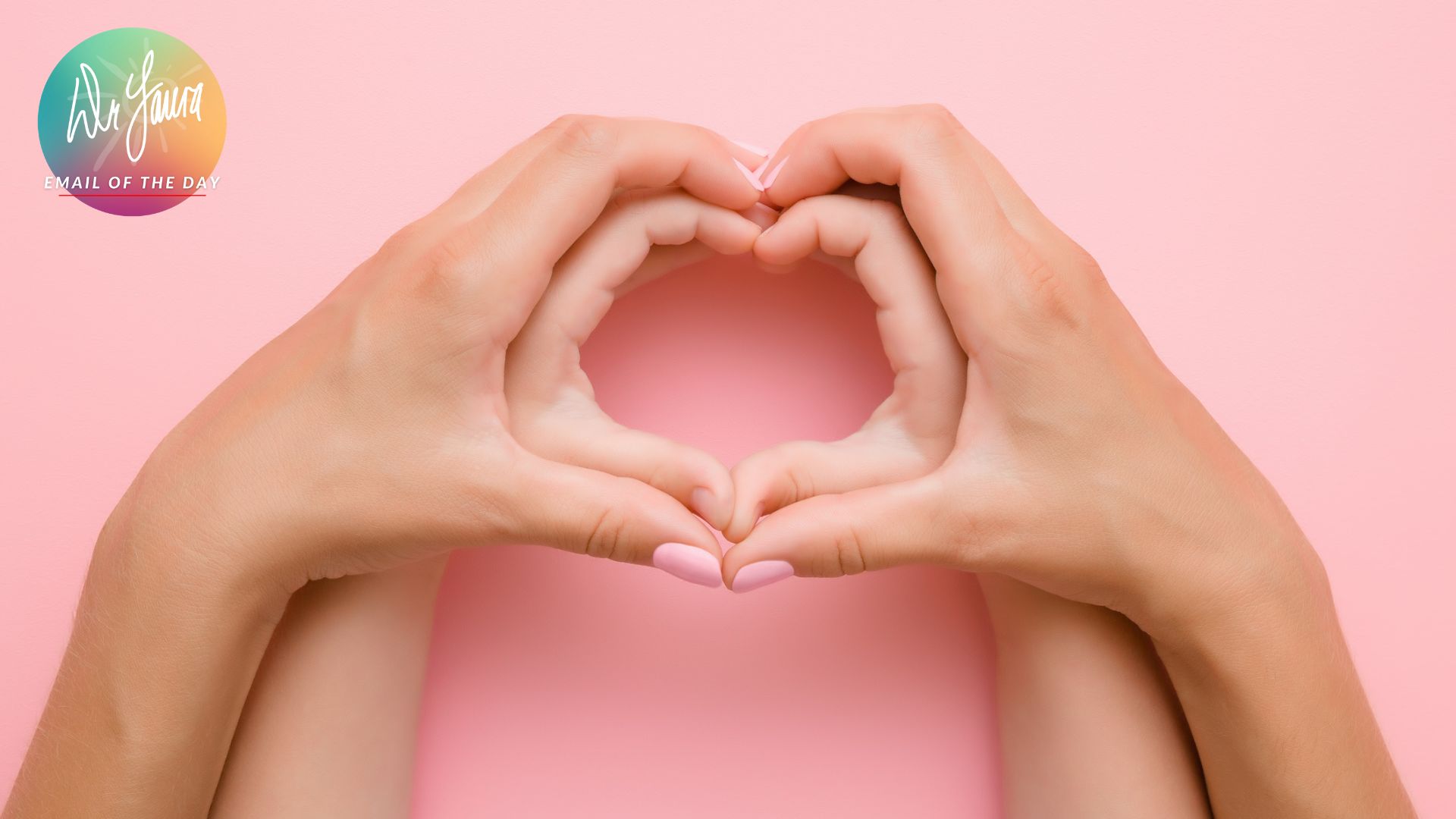 Bigger pair of hands makes heart with smaller pair of hands within it